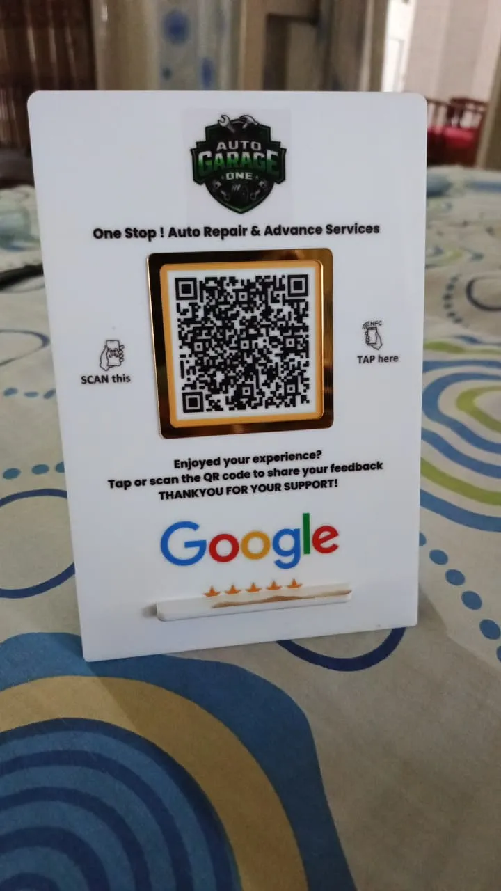 Counter stand with a QR code and NFC tag for leaving a Google review